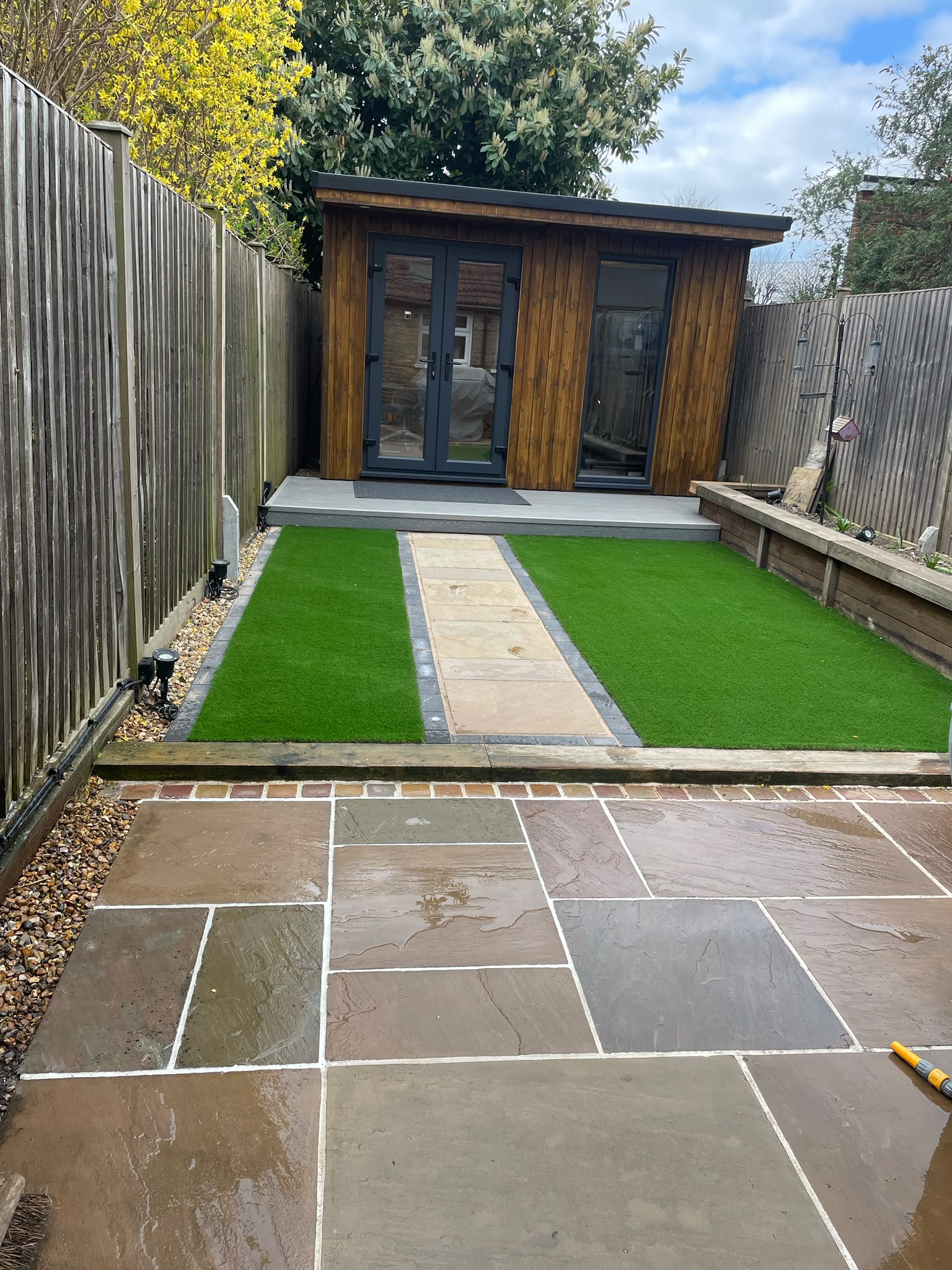 Patio, fencing and turf stabilisation with spurs